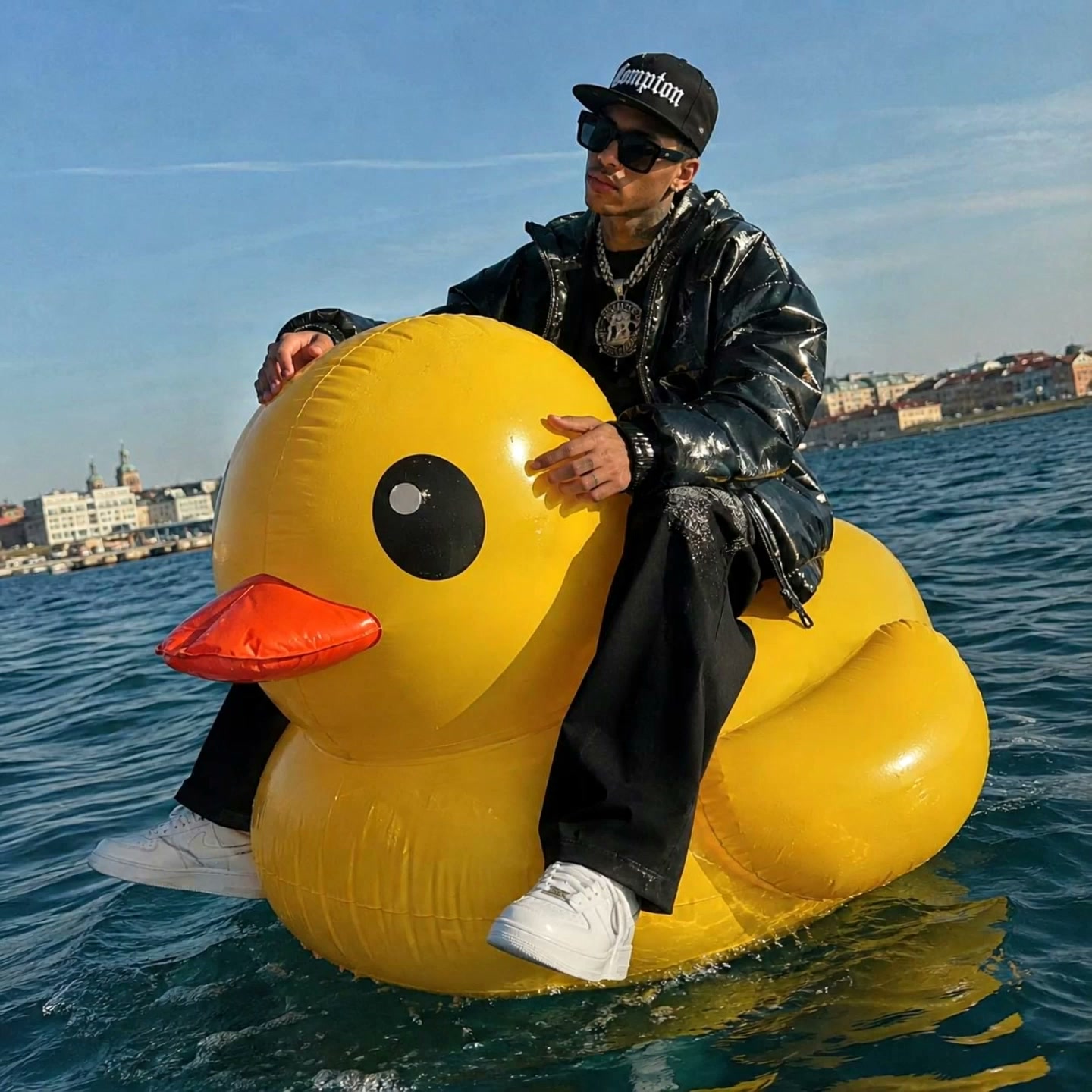AI video result — Use the reference image as the exact first frame. Keep the man’s face, sunglasses, cap, jewelry, black hip-hop…